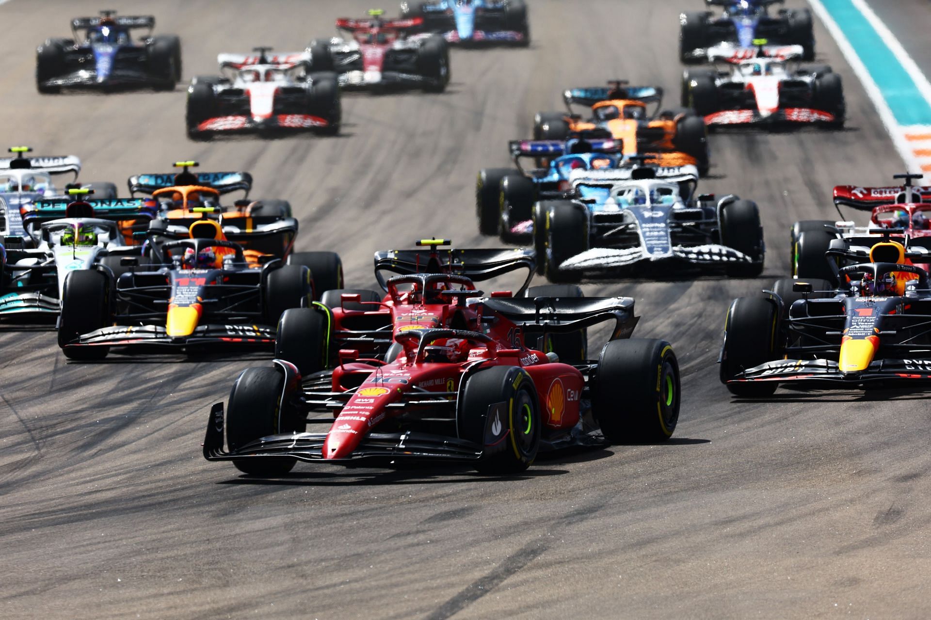 F1 Grand Prix of Miami - Charles Leclerc leads the field into turn 1