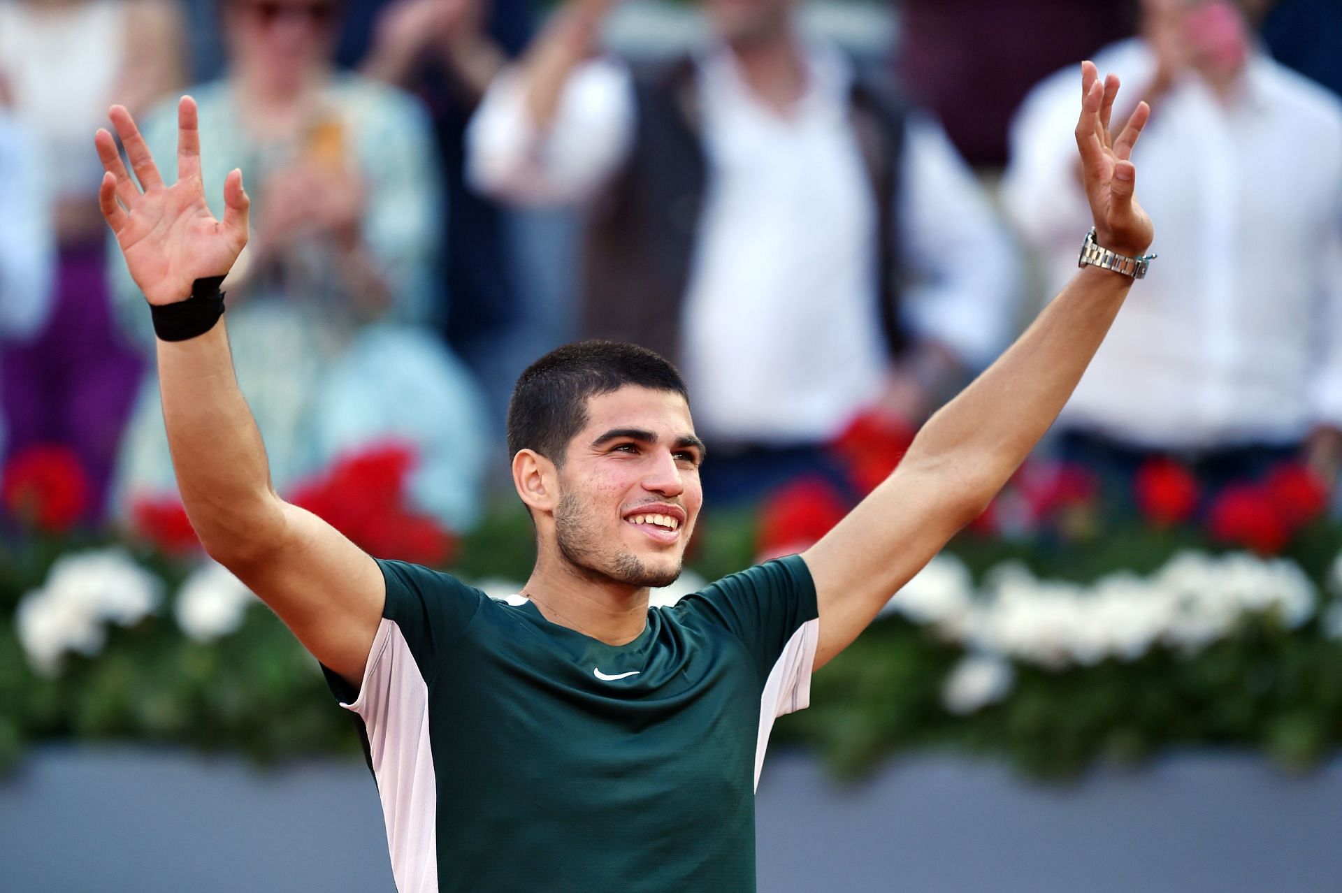Carlos Alcaraz rejoices after beating Novak Djokovic in the Madrid semifinals