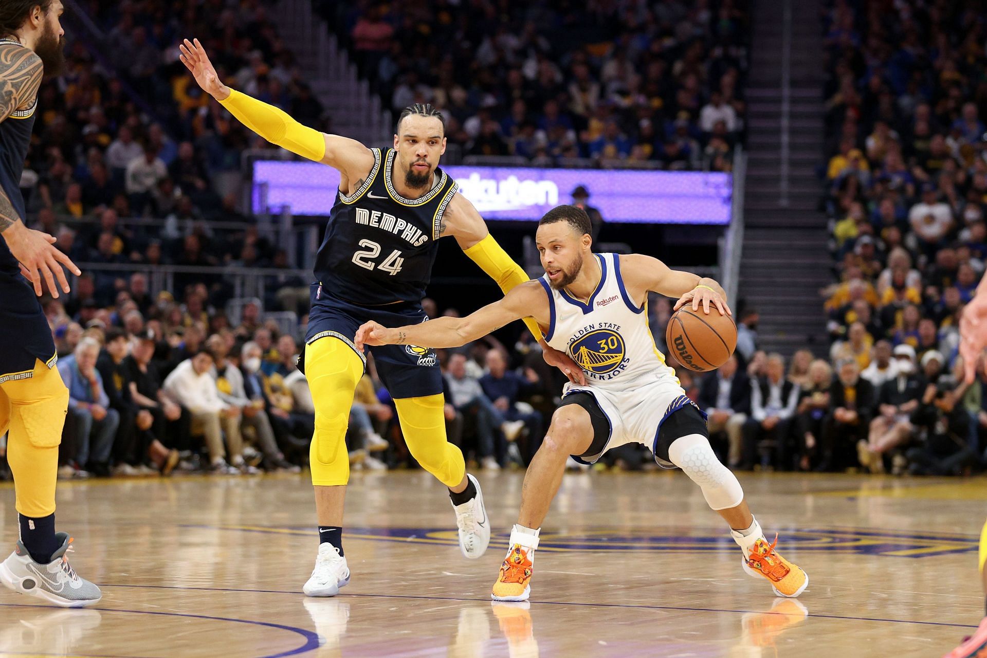 Dillon Brooks of the Memphis Grizzlies guards Steph Curry of the Golden State Warriors
