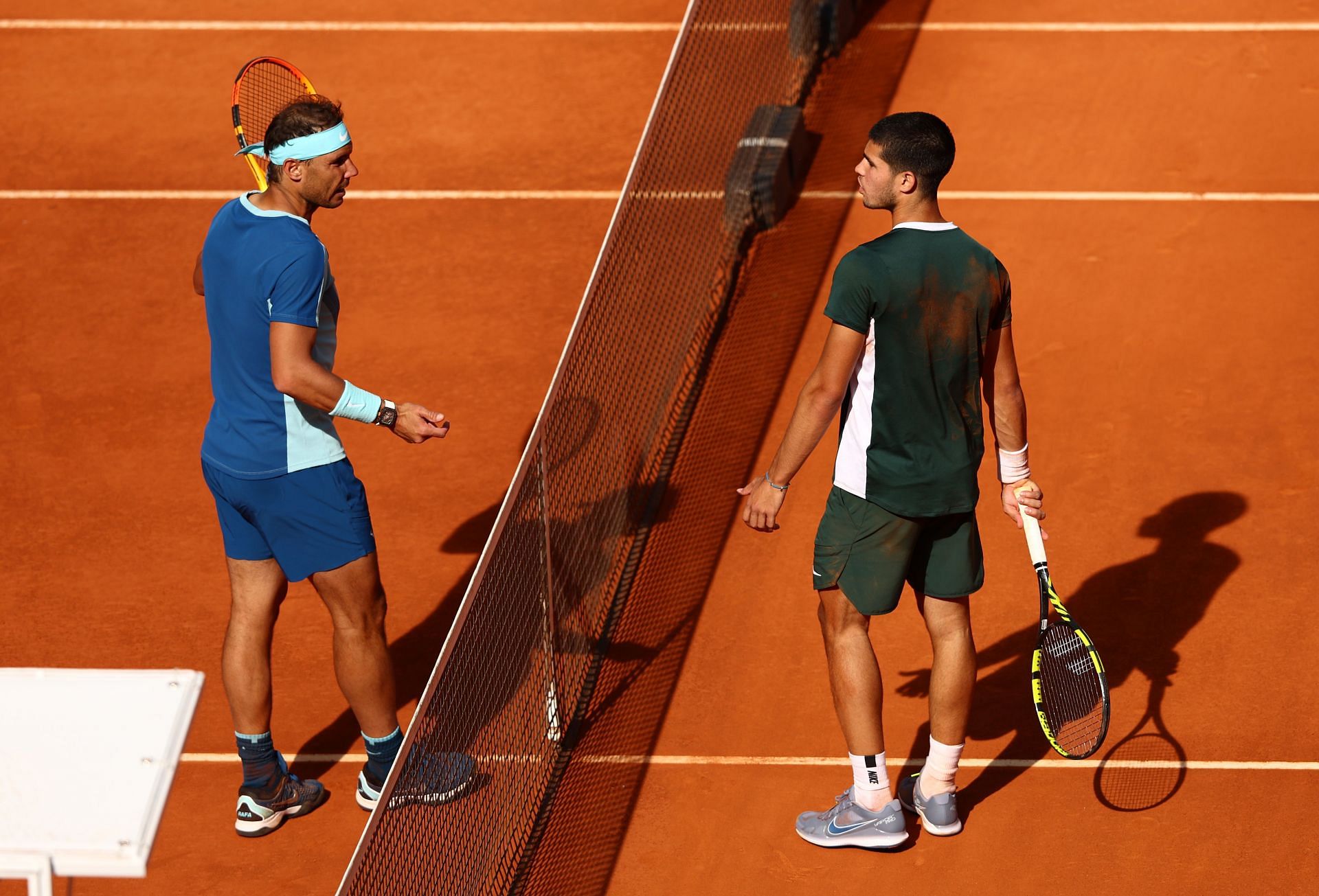 Carlos Alcaraz (right) beat Nadal in the Madrid quarterfinals