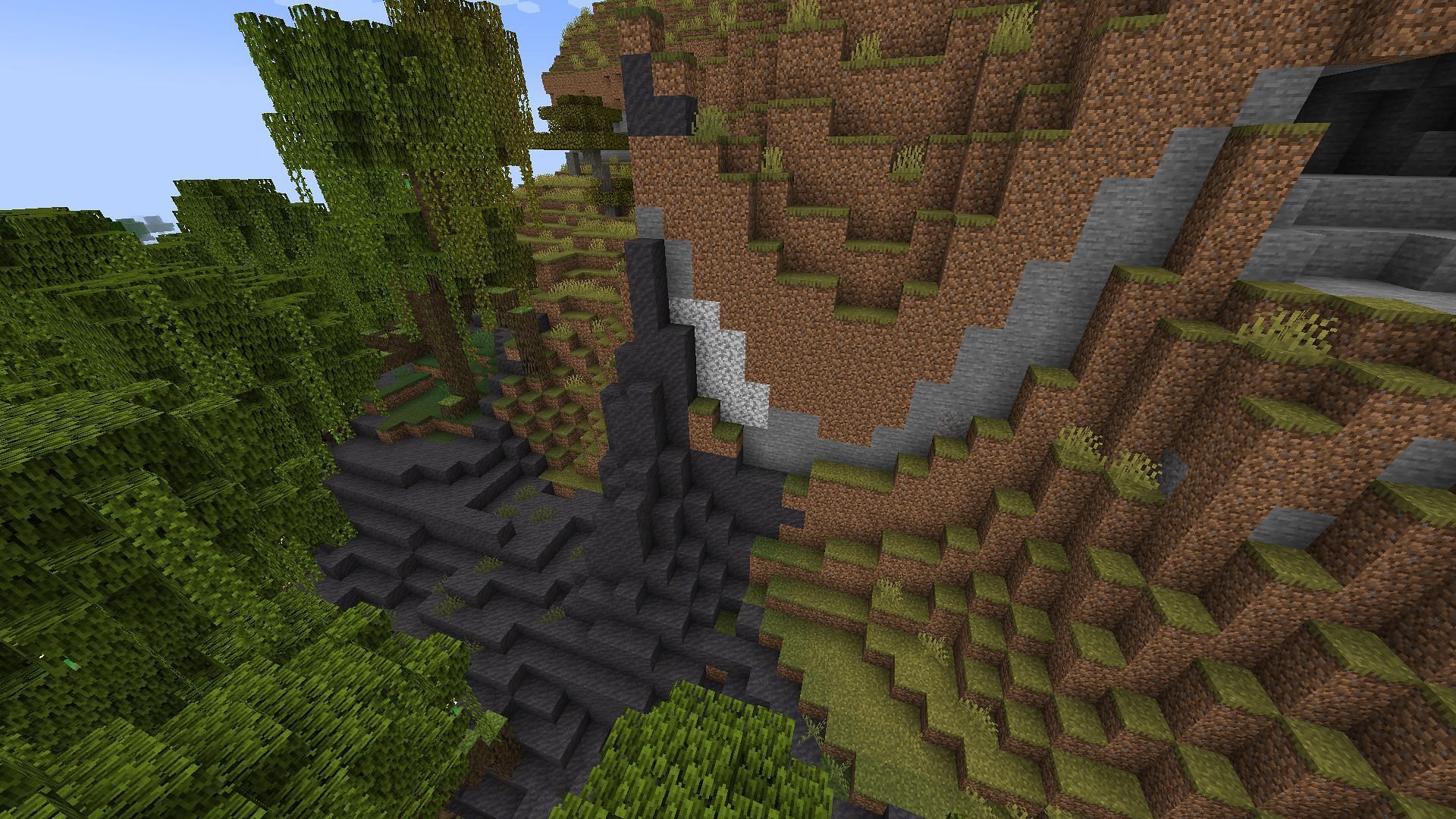 Mud blocks can be spotted from far away thanks to their darker shade (Image via Mojang)