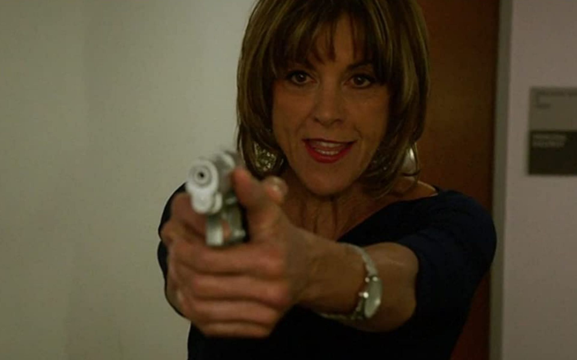 Wendie Malick in a still from Rush Hour (Image via IMDb)