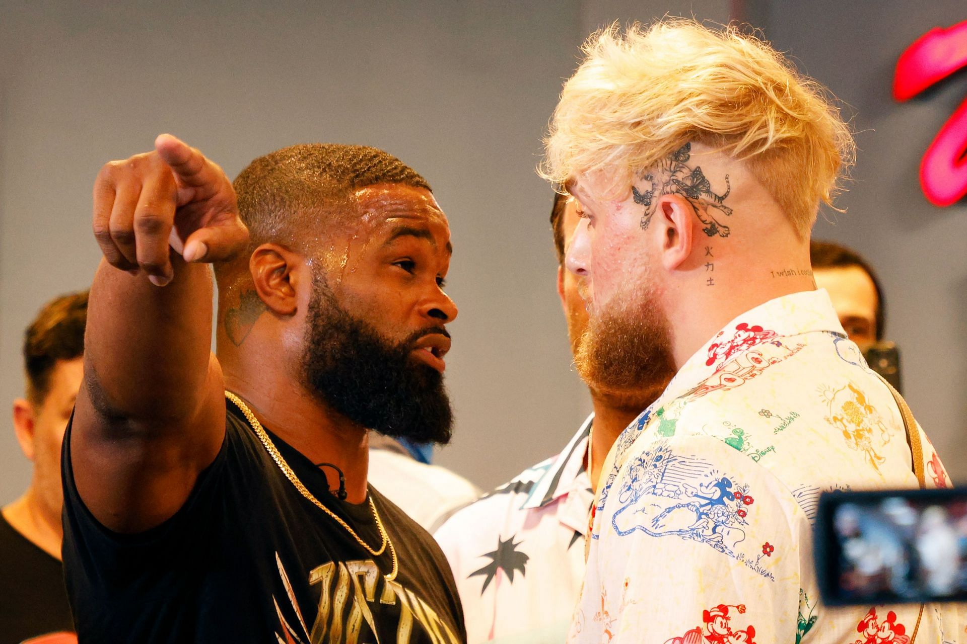 Tyron Woodley (left) and Jake Paul (right) (Image via Getty)