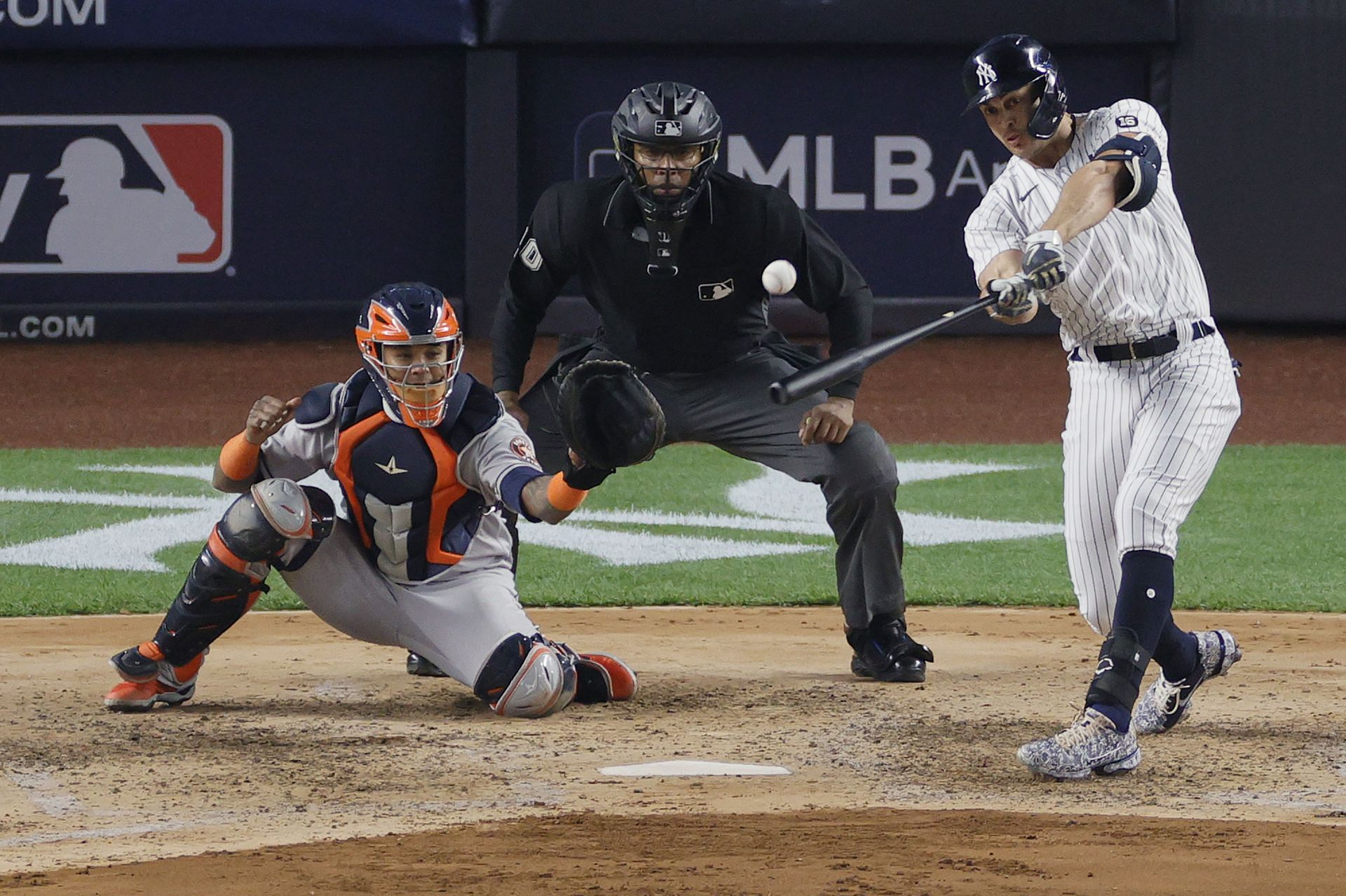Giancarlo Stanton crushes a hit during a Houston Astros v New York Yankees game last season.