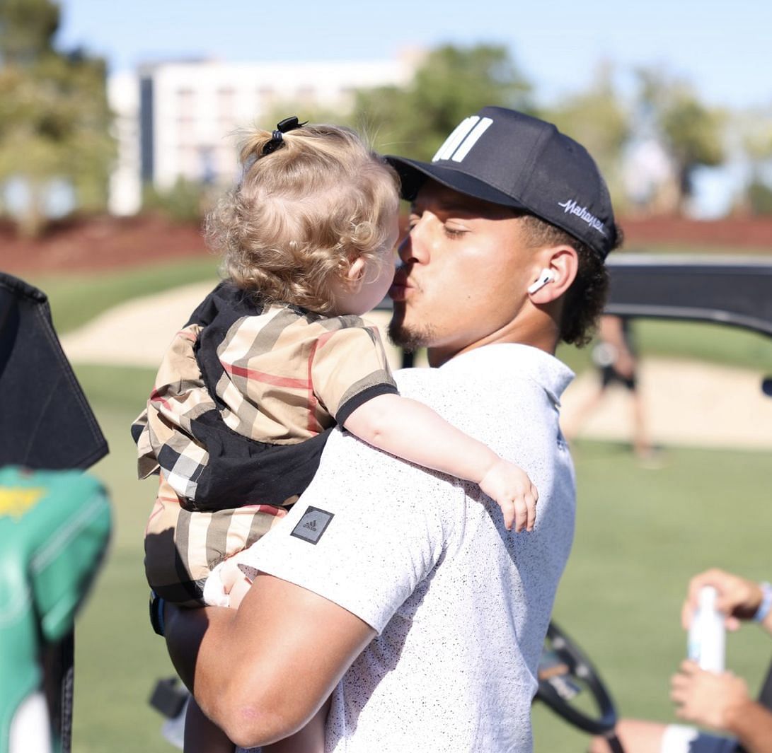 Chiefs QB Patrick Mahomes with daughter Sterling Skye during Capital One&#039;s The Match. Source: Ben Walton for Golf Digest
