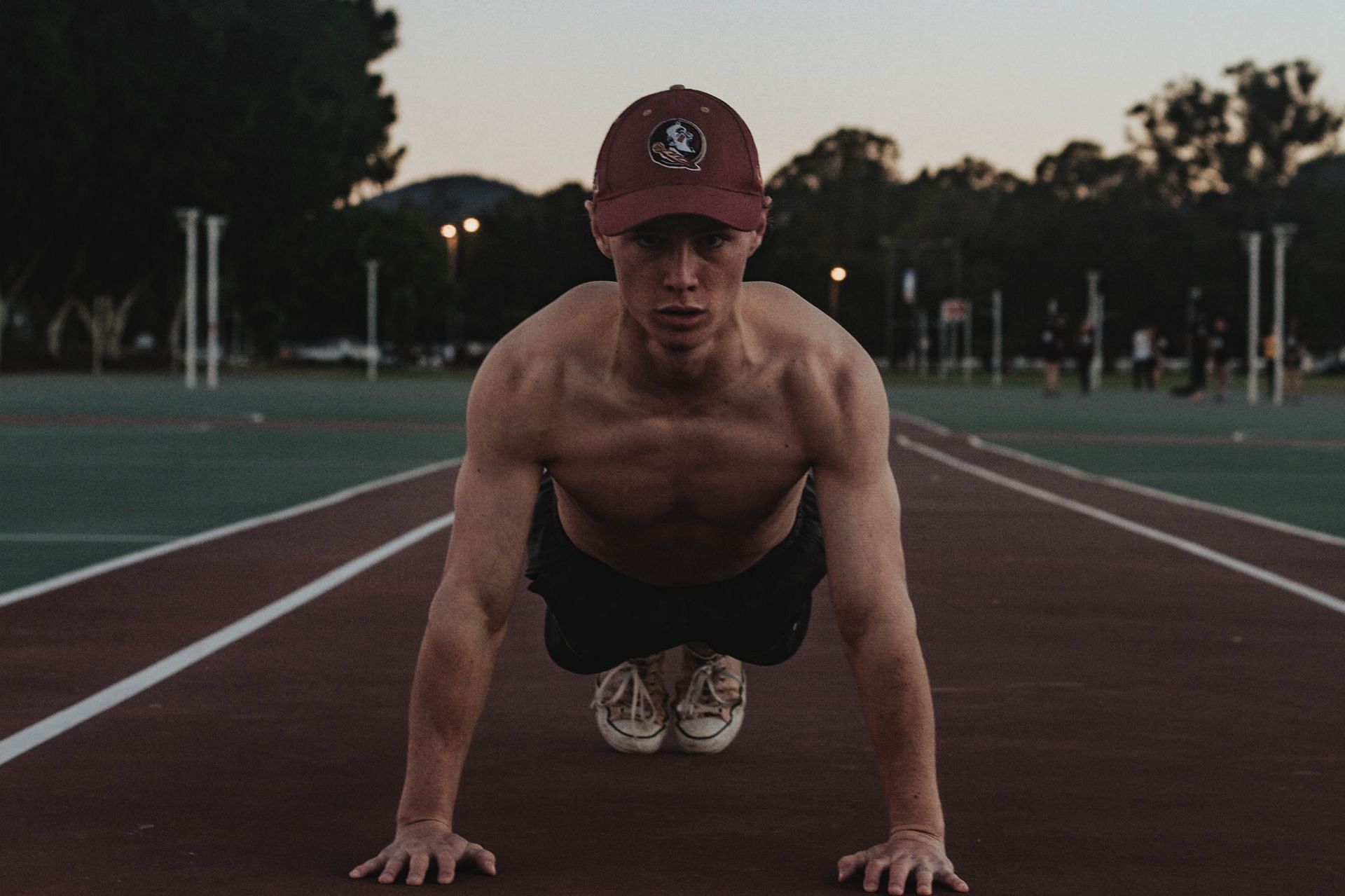 Slider exercises to effectively challenge and engage your core muscles (Image via Unsplash/James Barr)
