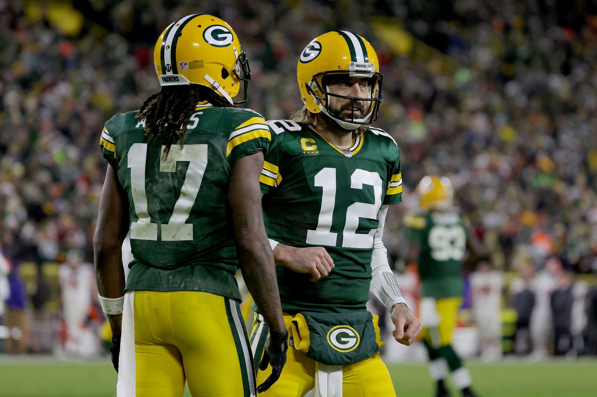 Davante Adams and Aaron Rodgers celebrate scoring a touchdown against the Cleveland Browns