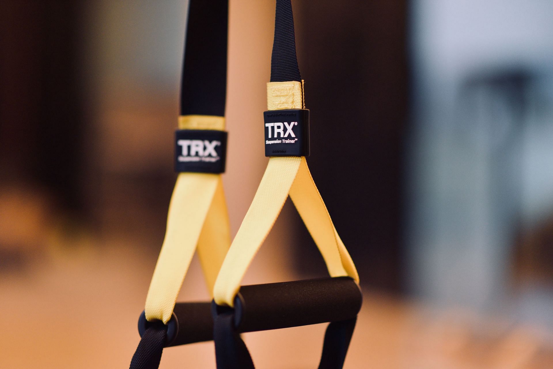 TRX Row exercises helps you to strengthen upper back and gives total body workout. (Image via Unsplash / Deepigoyal)