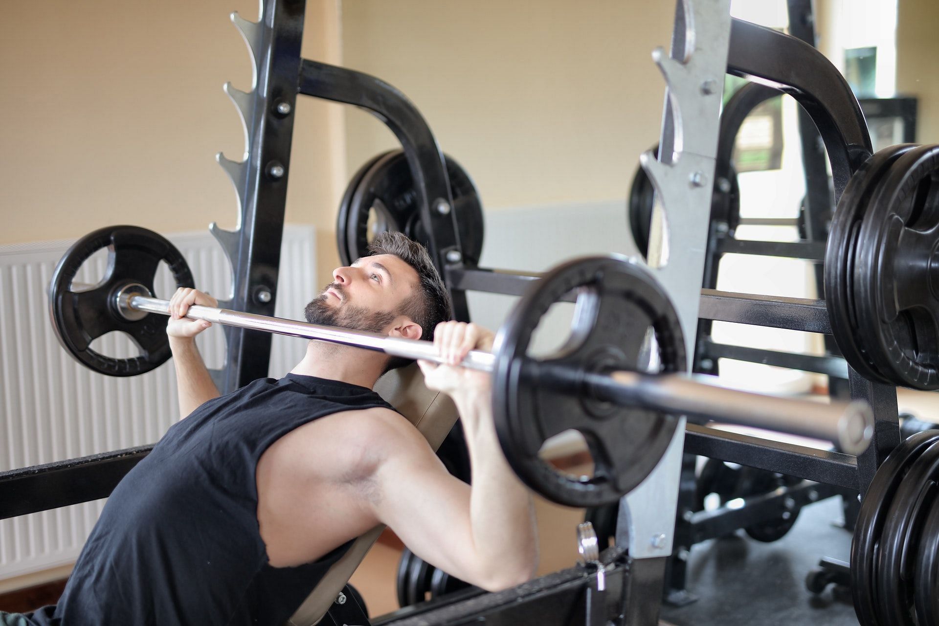 Guide to best compound chest exercises for growth. (image via Pexels/Photo by Andrea Piacquadio)