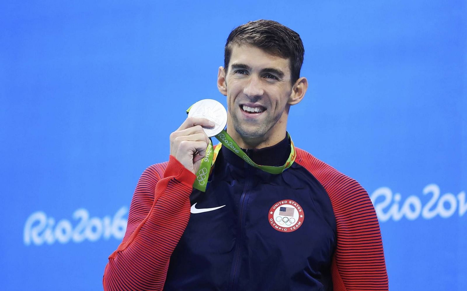 Does Michael Phelps' body produce less lactic acid than average person?