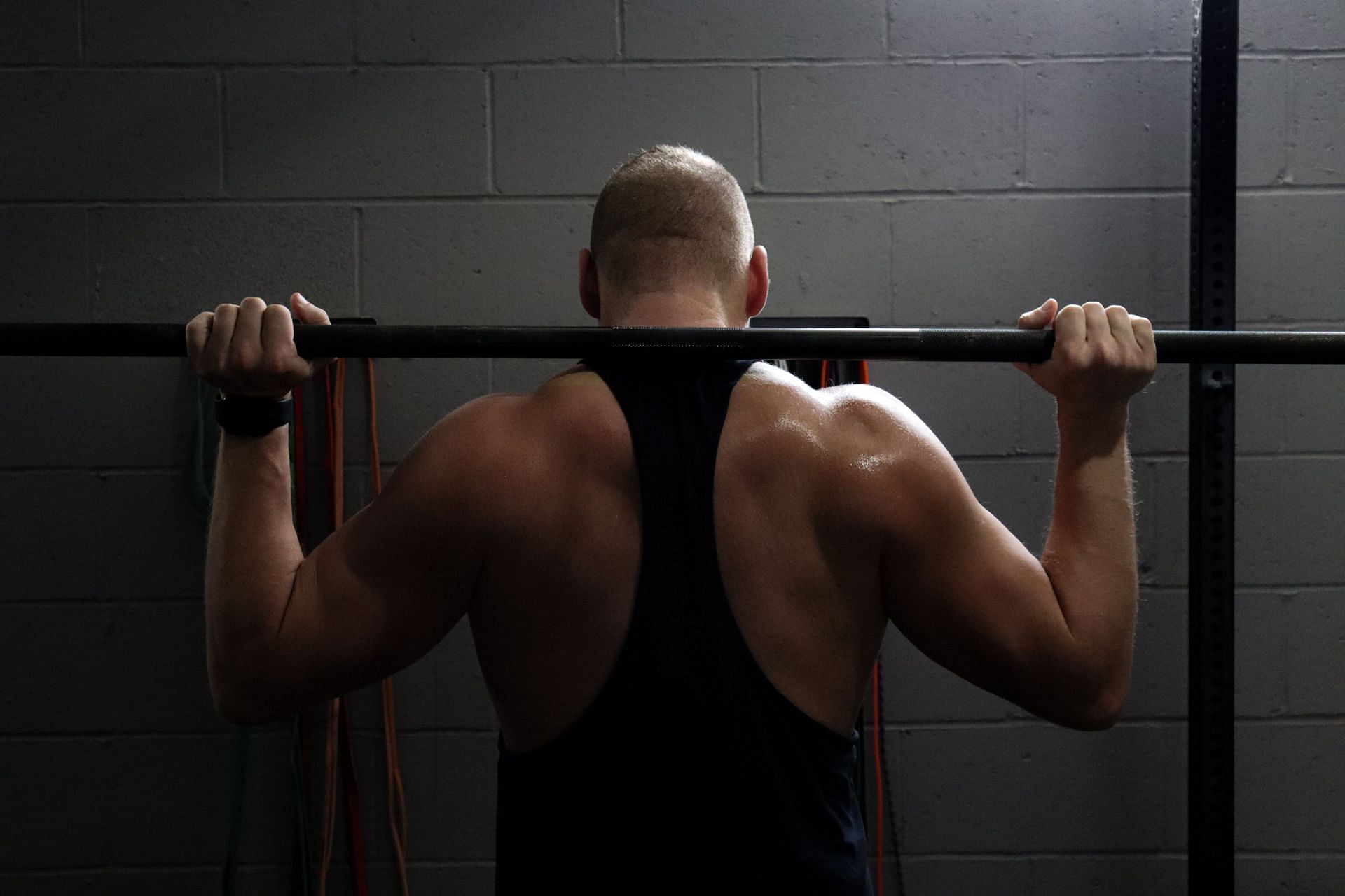 Dumbbell workout stimulates and enhances shoulder muscle growth. (Image via Unsplash / Morrow Solutions)
