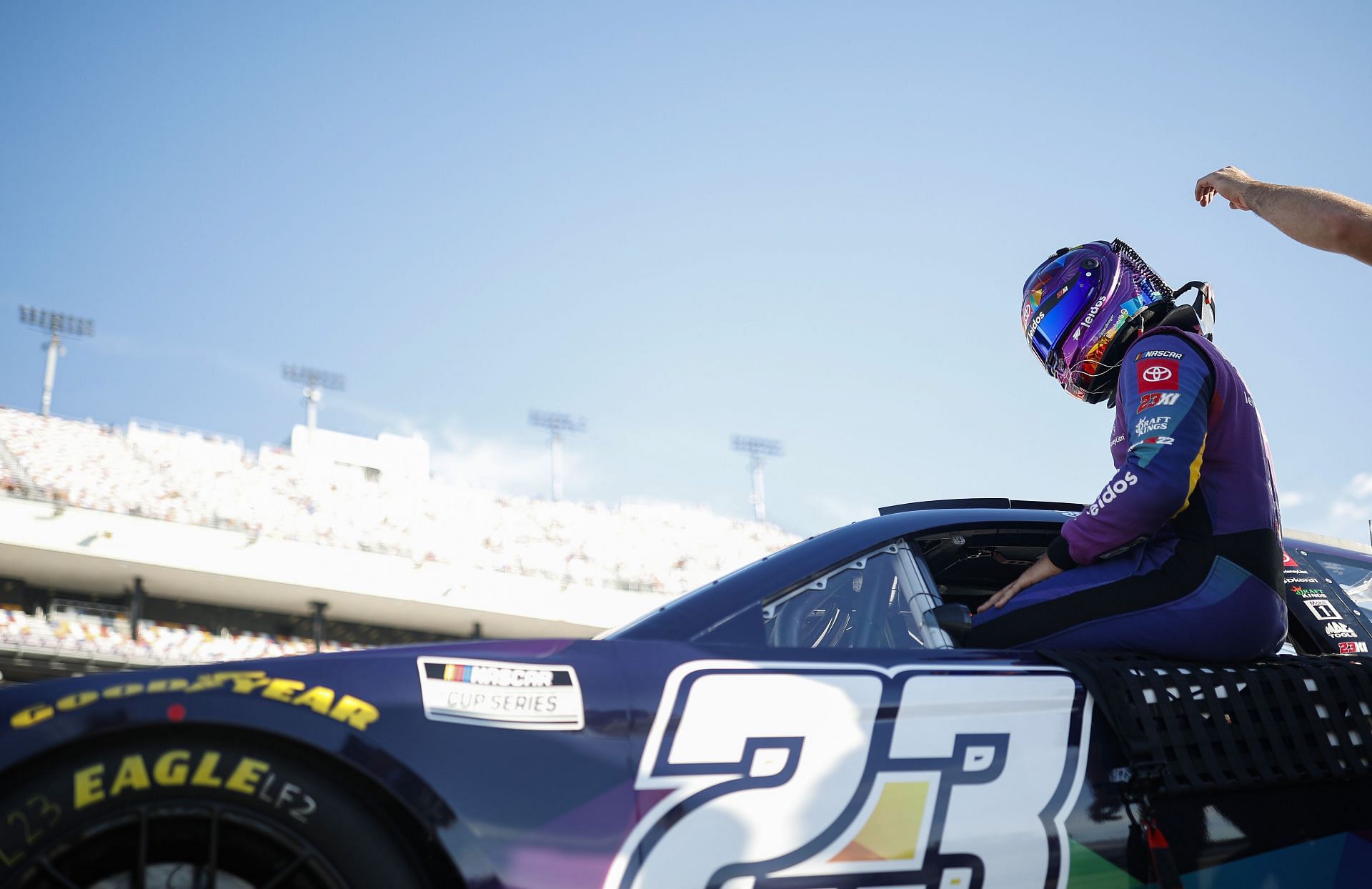 Bubba Wallace Jr. enters his car during qualifying for the 2022 NASCAR Cup Series Federated Auto Parts 400 at Richmond Raceway in Richmond, Virginia (Photo by Jared C. Tilton/Getty Images)