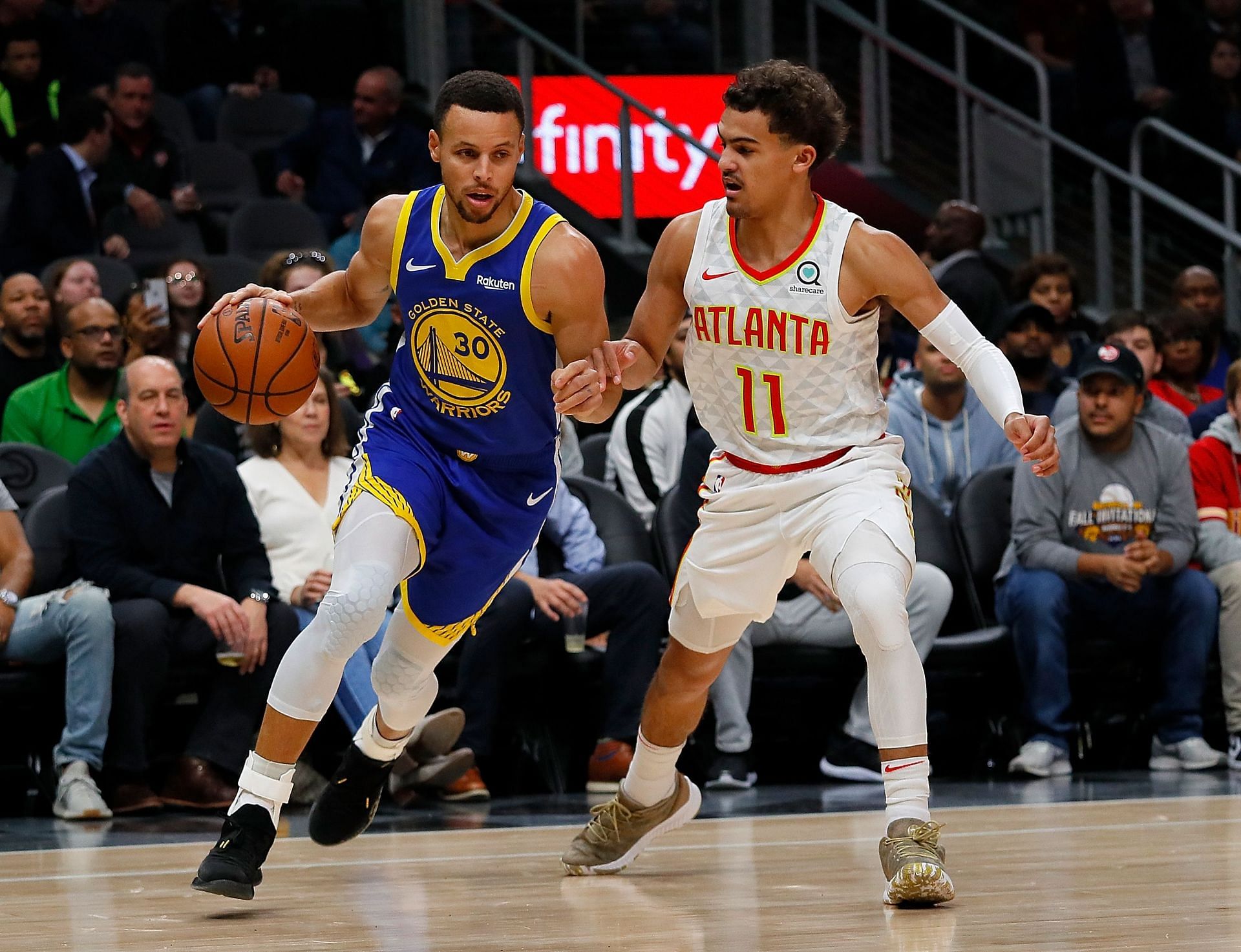 Steph Curry of the Golden State Warriors against Trae Young of the Atlanta Hawks in 2018