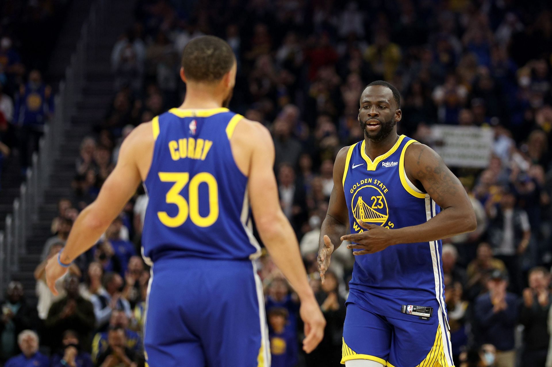 Golden State Warriors stars Stephen Curry, left, and Draymond Green