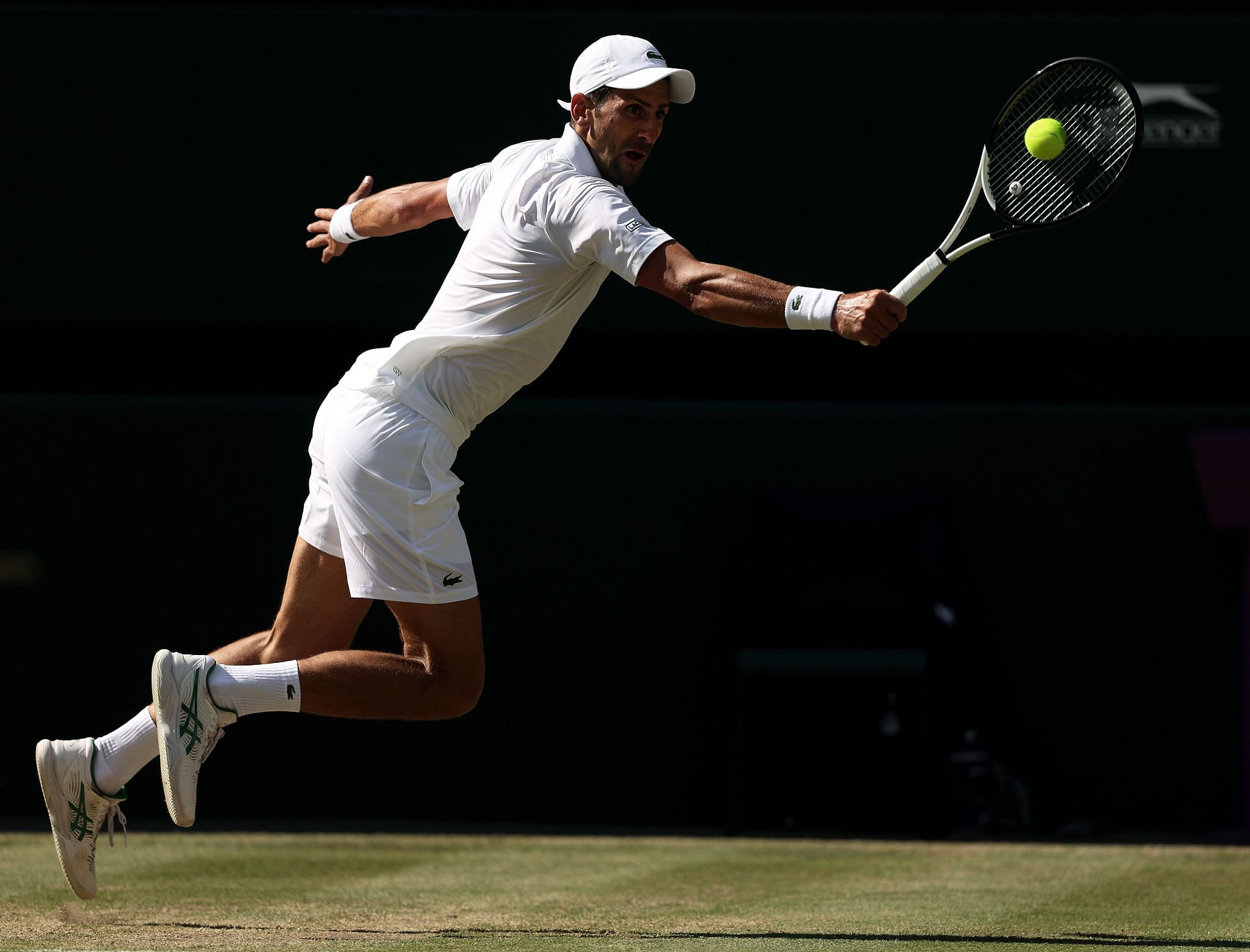 Novak Djokovic in action. Photo by Julian Finney/Getty Images
