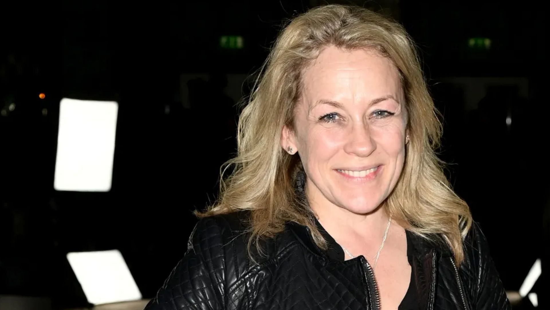 Sarah Beeny revealed she cut her hair with the help of her family and donated it to a charity that makes free wigs for children with cancer. (Image via Gareth Cattermole/Getty)