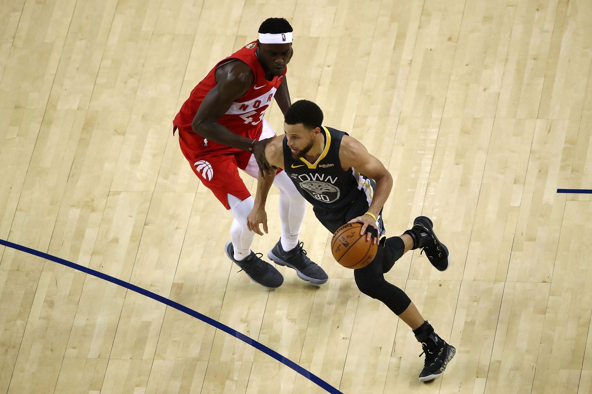 Steph Curry of the Golden State Warriors against Pascal Siakam of the Toronto Raptors during the 2019 NBA Finals