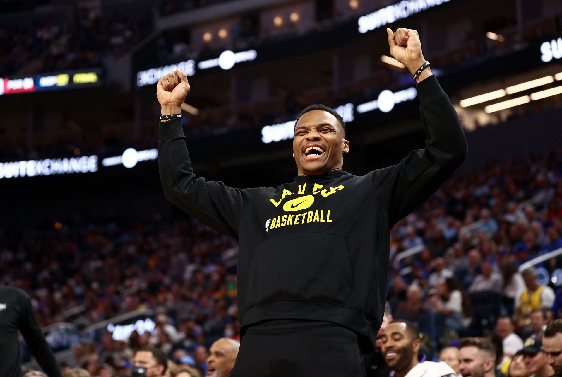 Russell Westbrook of the LA Lakers cheers his team on the bench