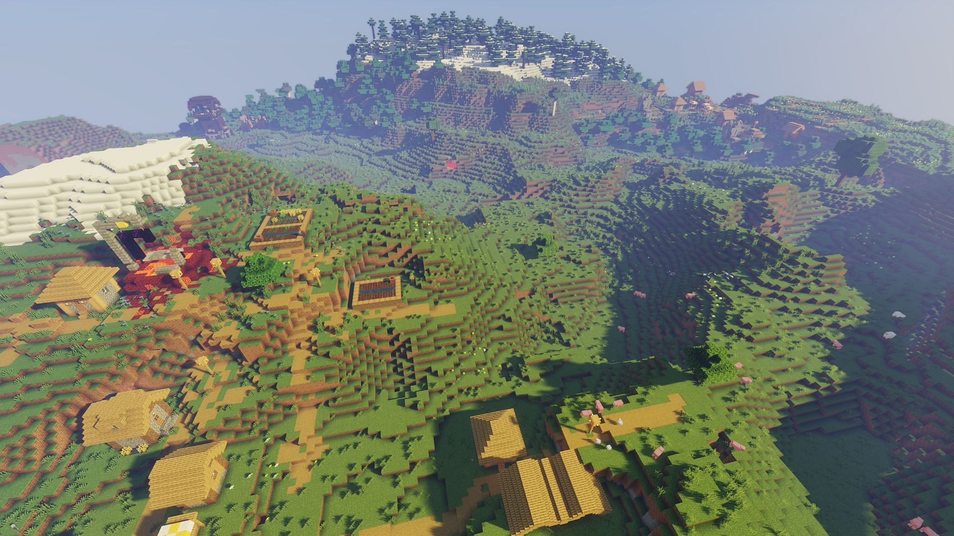 Double villages feature a ruined portal and raider outpost (Image via Minecraft)