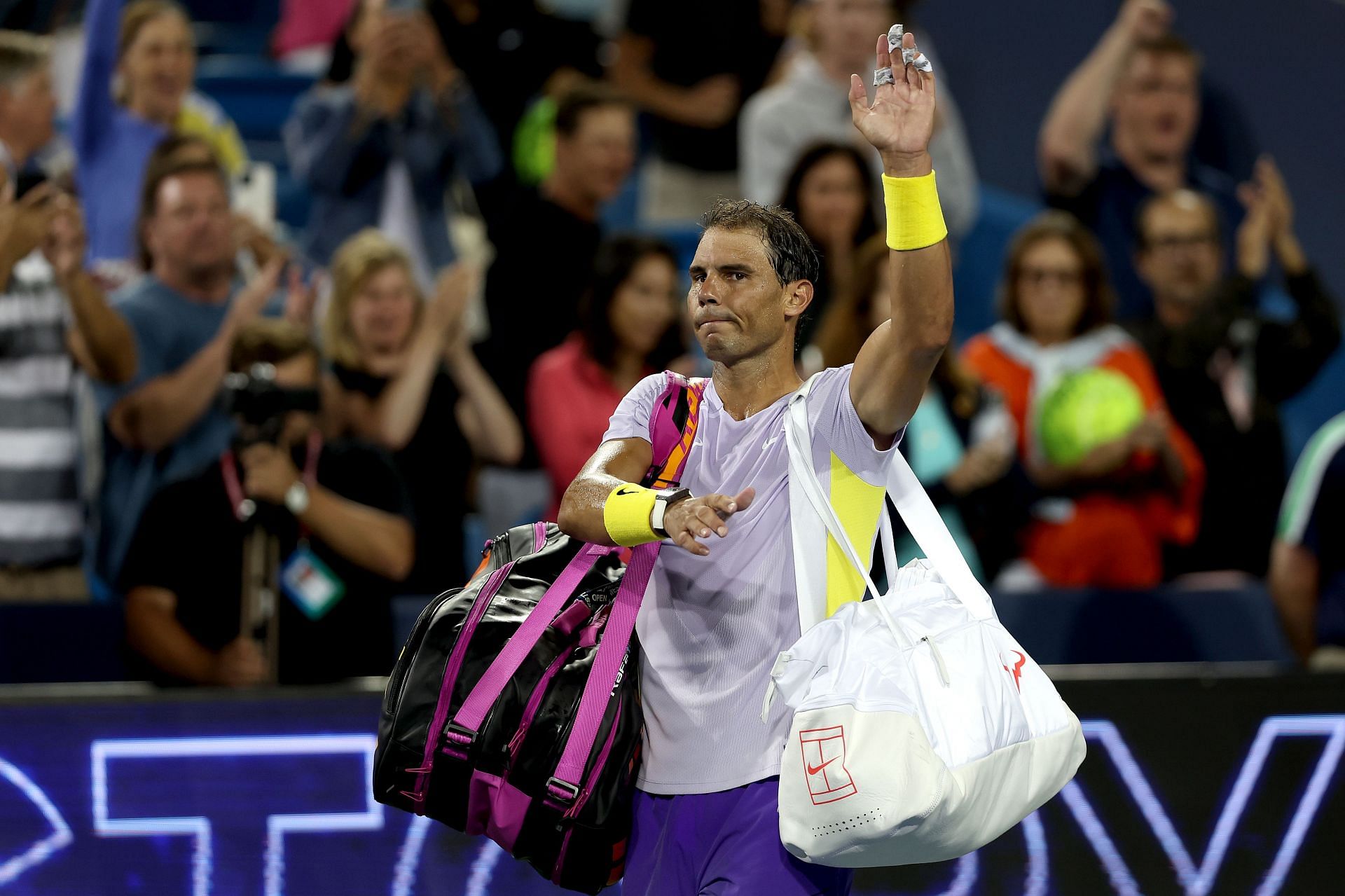 Rafael Nadal greets the crowd as he leaves the pitch after losing to Borna Coric in Cincinnati