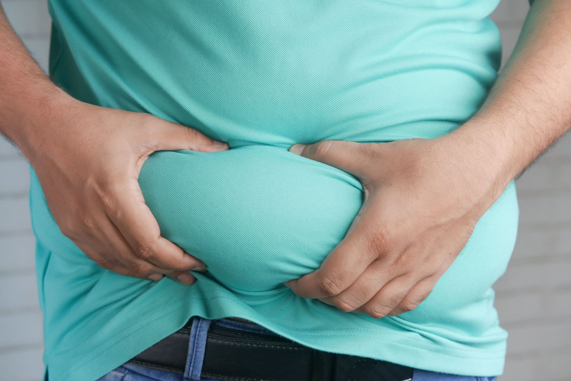 Belly fat can be particularly harmful to health as it can be the cause for many diseases (Image via Pexels @Towfiqu Barbhuiya)