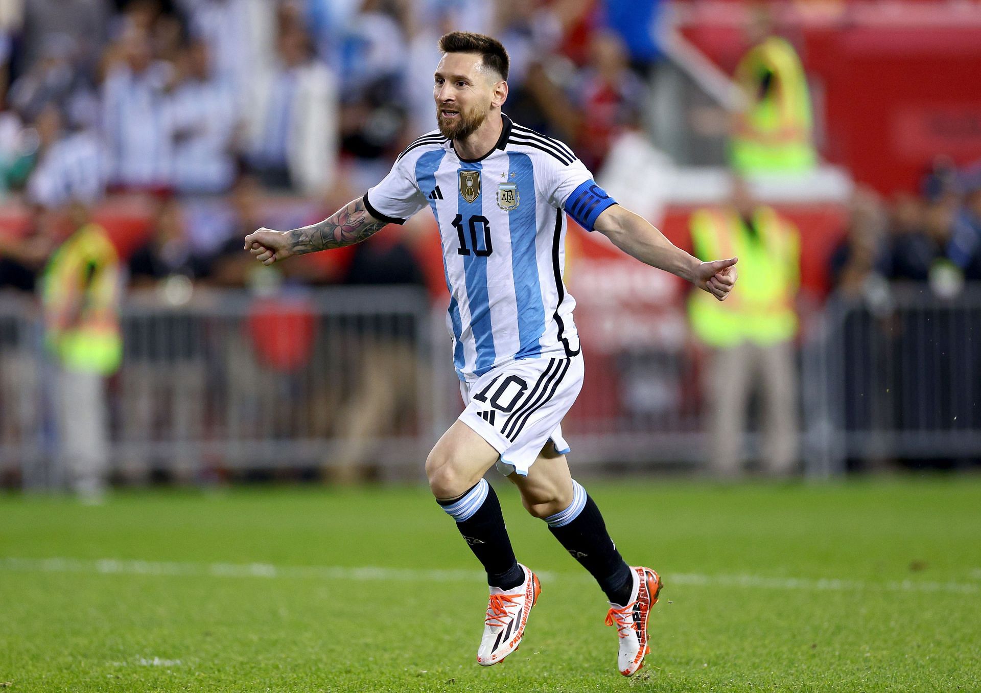 Lionel Messi celebrates after scoring against Jamaica