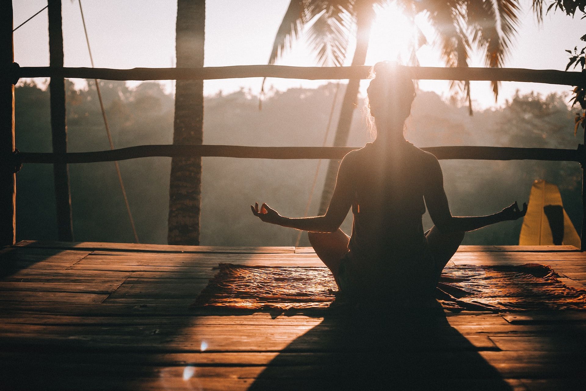 Yoga is one of the best things you can do to start your day. (Photo via Unsplash/Jared Rice)