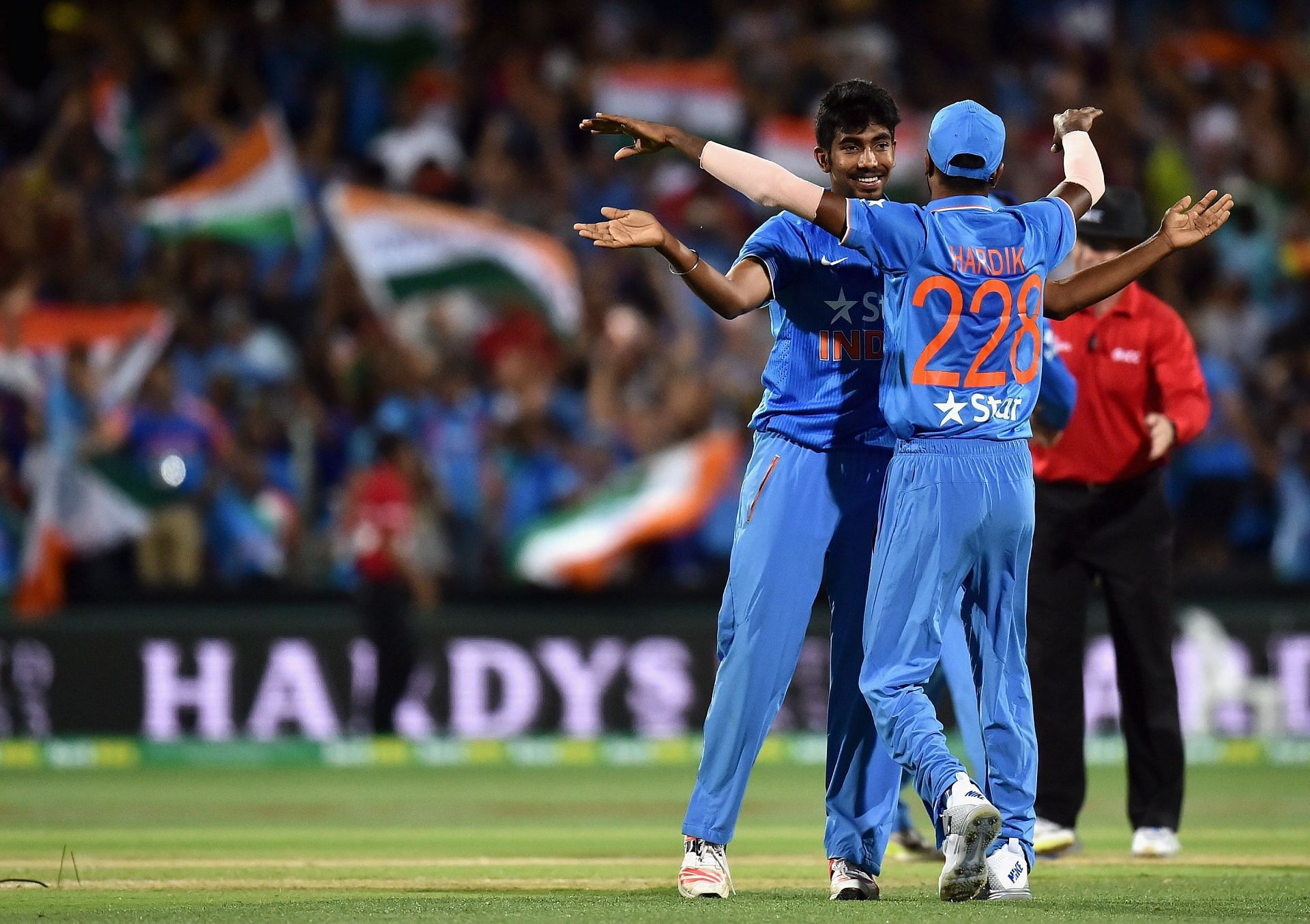 Jasprit Bumrah celebrates with Hardik Pandya after Team India's win over Australia in the 2016 T20I. Image: Getty Images