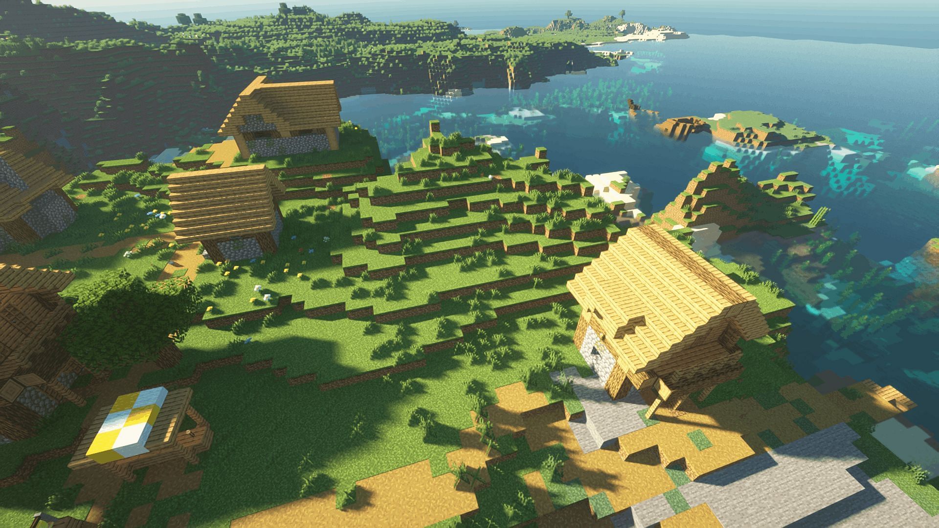 A plains village with the SEUS shader applied (Image via Minecraft)