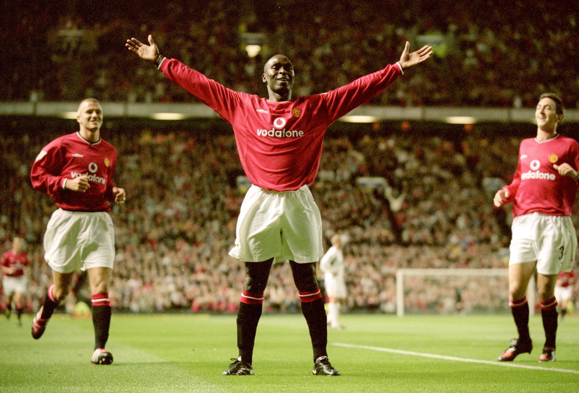 Andy Cole celebrates after scoring for Manchester United