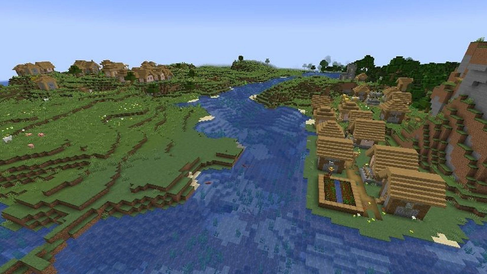 Two villages rest peacefully over each other along a river (Image via Mojang)