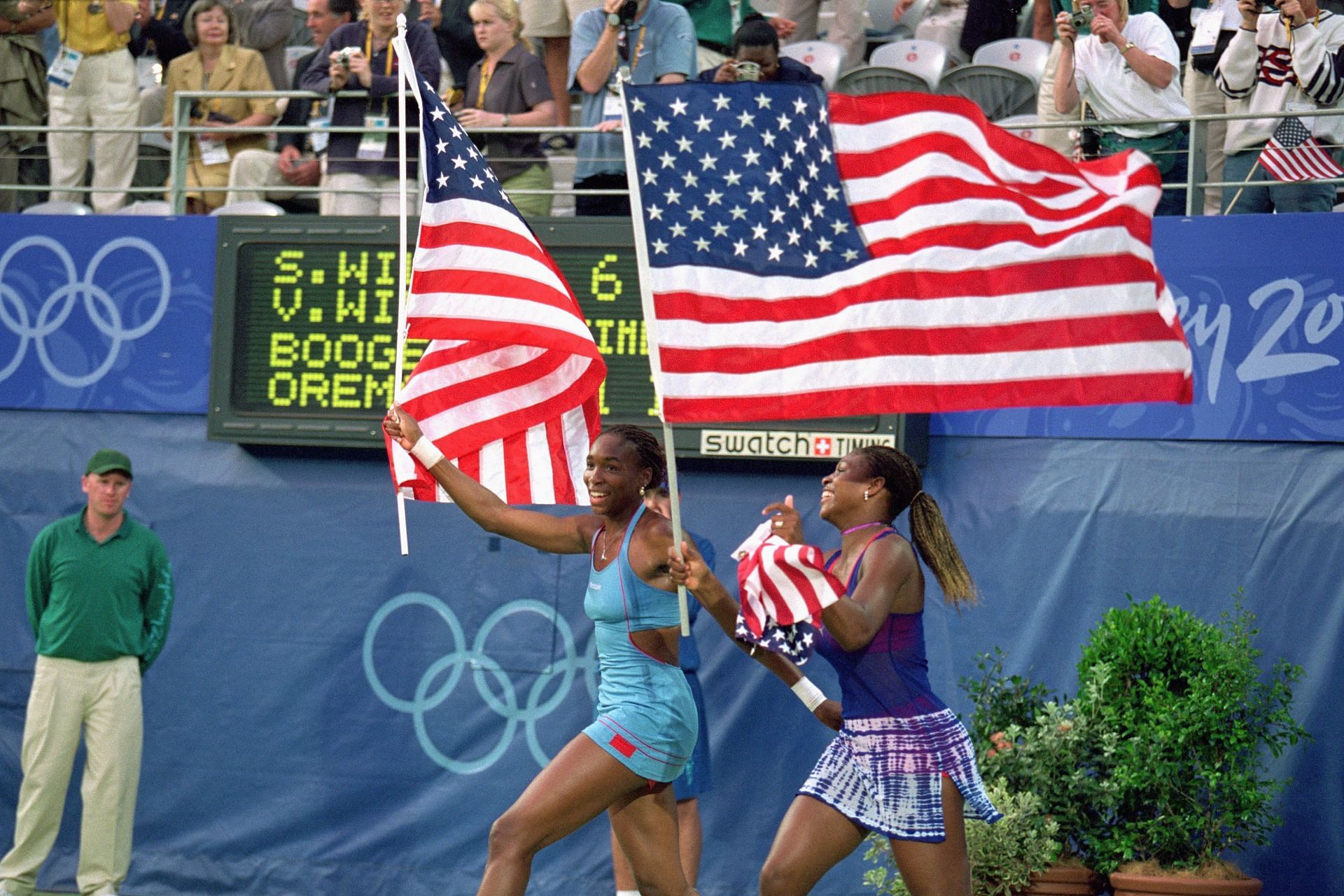 Venus and Serena Williams celebrate doubles win