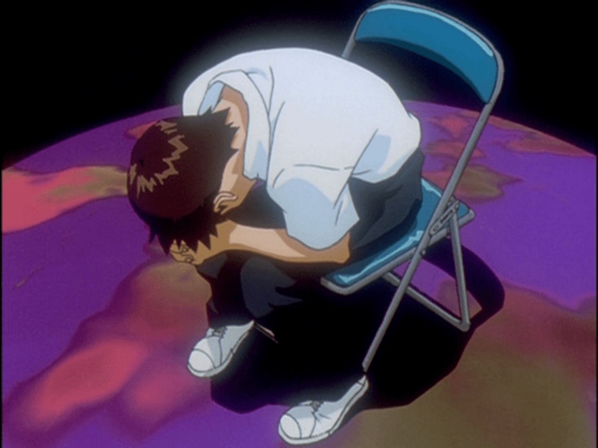 Shinji depressed in the chair (Image via Studio Gainax)