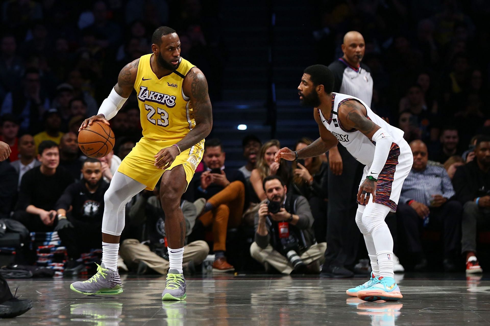 LA Lakers forward LeBron James, left, and Brooklyn Nets guard Kyrie Irving