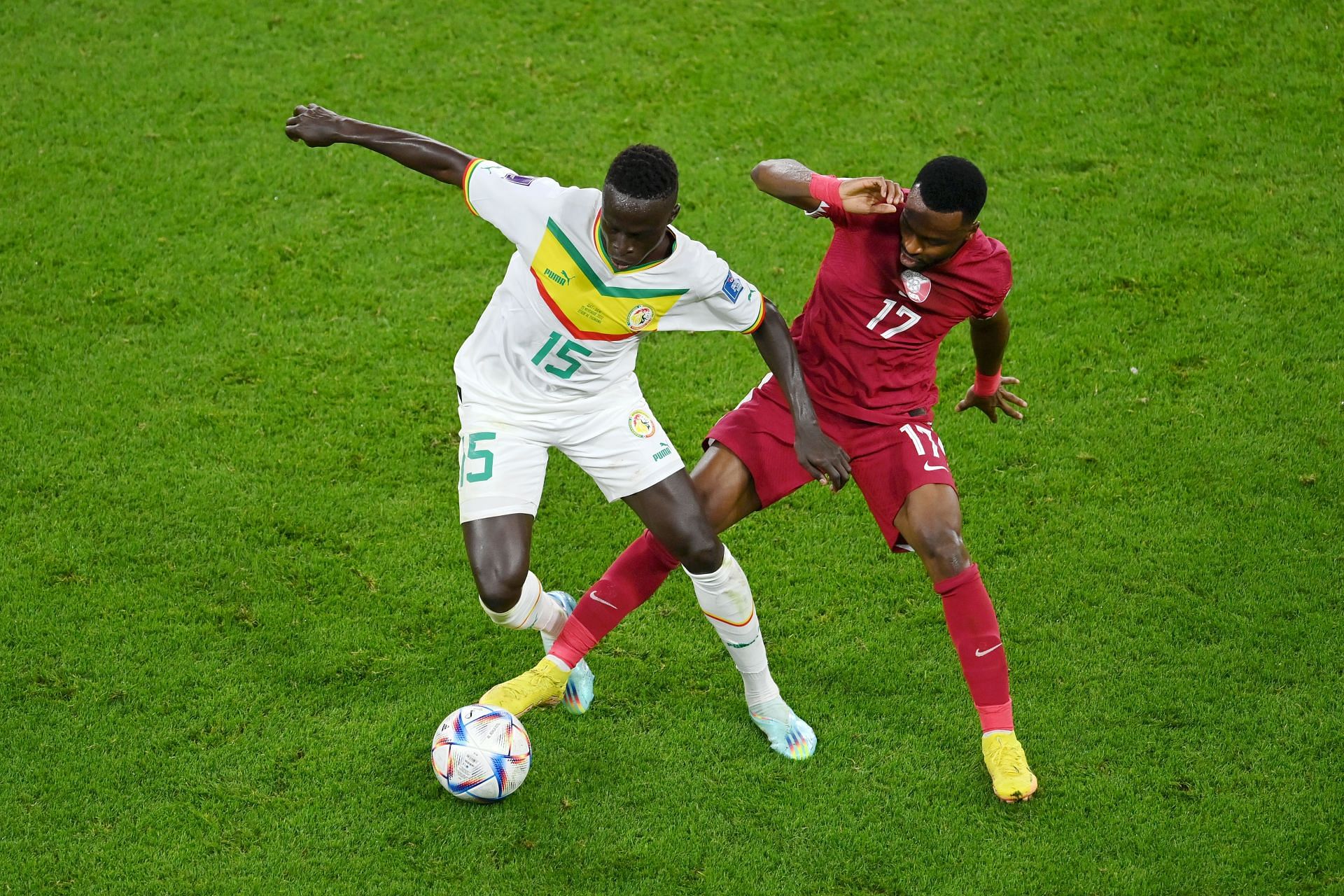 Krepin Diatta battles for possession with Ismael Mohamad.
