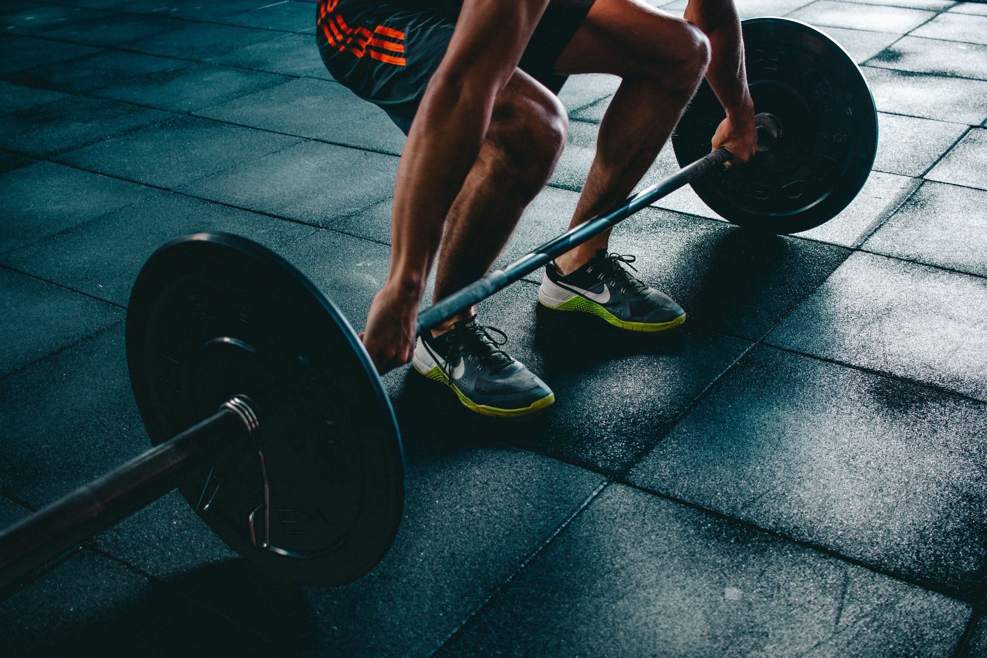 The deadlift, while a classic back exercise, could actually hurt you over time. (Image via unsplash/Victor Freitas)