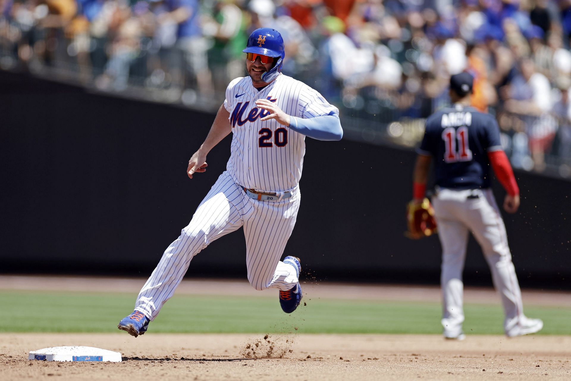 Pete Alonso rounds second base against the Atlanta Braves in the first game of a doubleheader at Citi Field