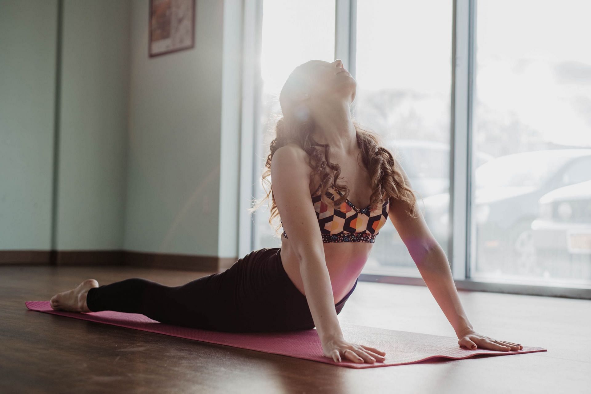 Yoga is great for your mind and even better for your back! (Image via Unsplash/Olivia Bauso)