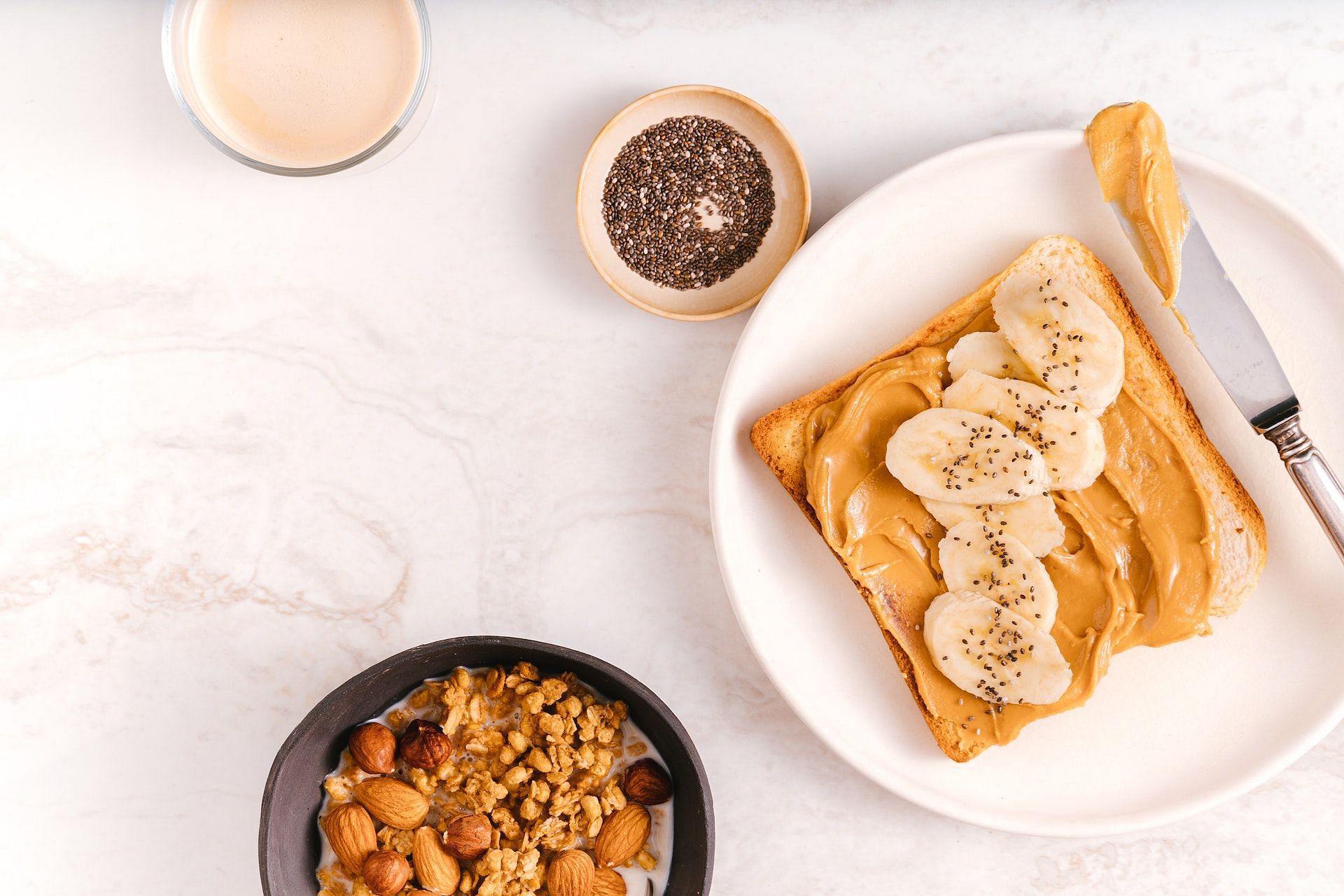 Whole grain bread and peanut butter are great pre-workout food options. (Photo via Pexels/Antoni Shkraba)