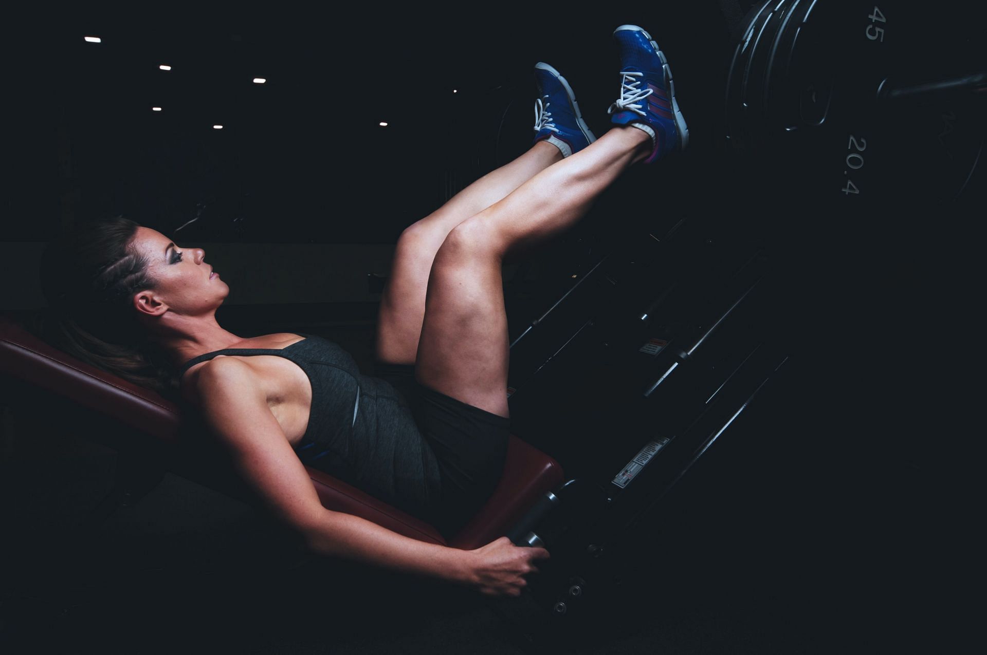 The leg press is a popular leg workout, but it could do more harm than good. (Image via unsplash/Scott Webb)