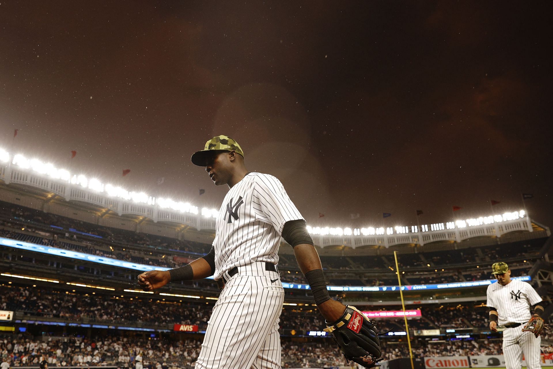 Estevan Florial of the New York Yankees heads to the dugout.