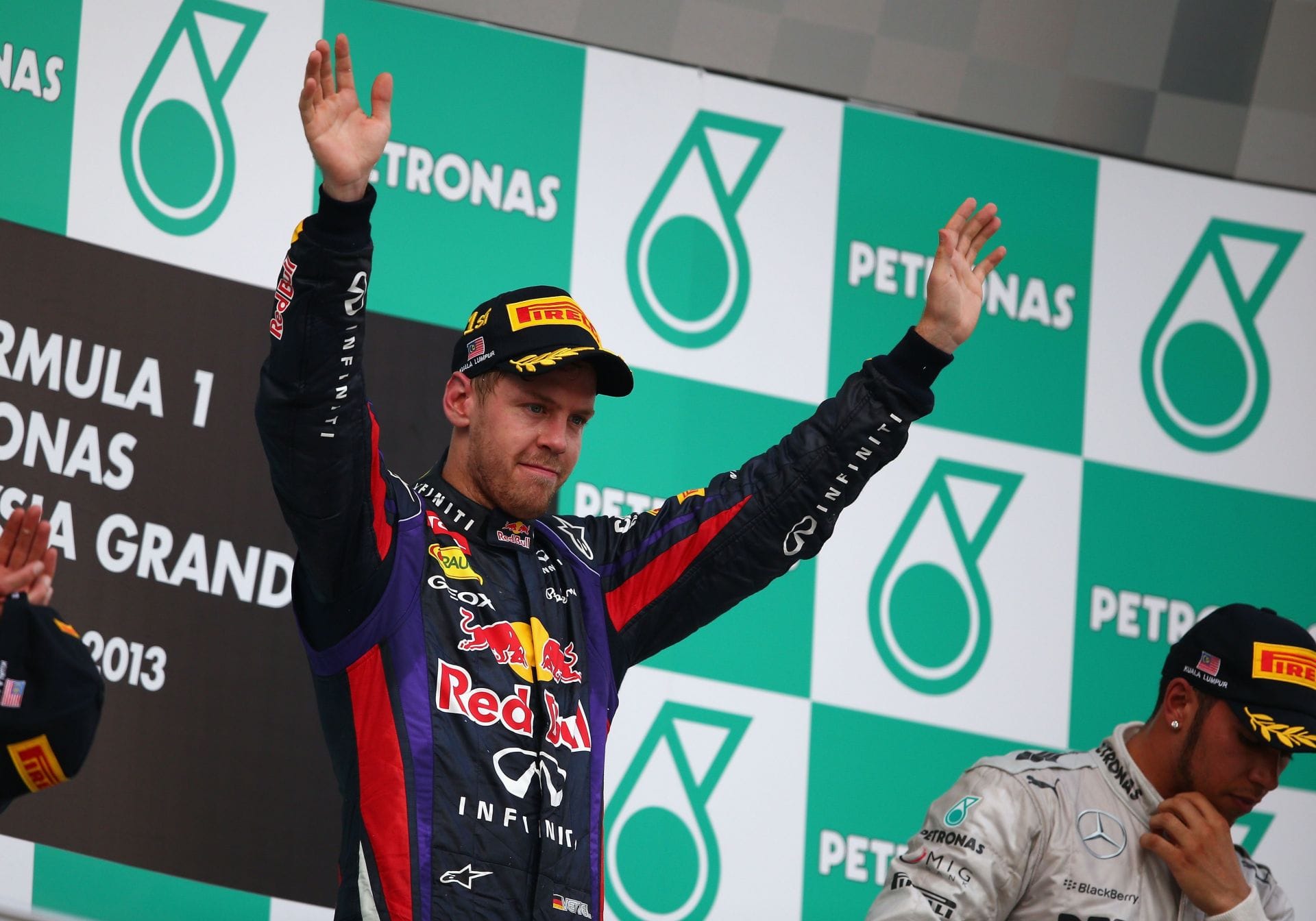 Sebastian Vettel and Mark Webber racing intensely