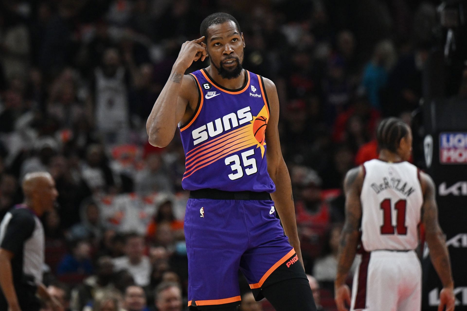 Fans go berserk as Kevin Durant tweaks ankle during pregame shoot around:  "He slipped on Devin Bookers tears from all the crying he does"