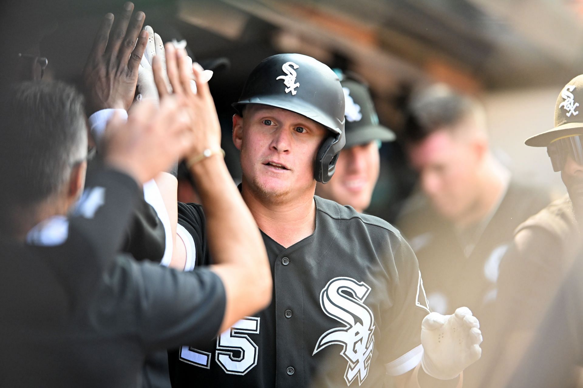 Andrew Vaughn #25 of the Chicago White Sox celebrates with teammates after hitting a solo home run