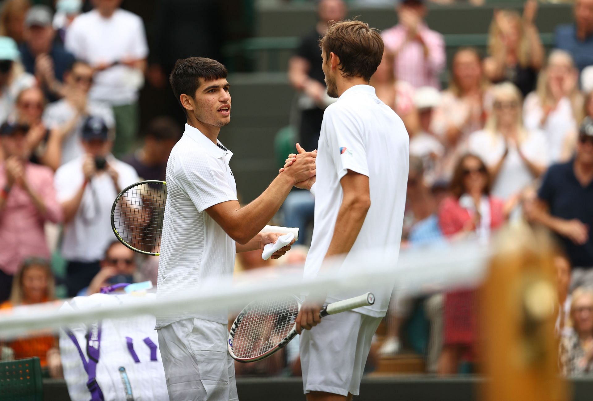 Carlos Alcaraz and Daniil Medvedev at the 2021 Wimbledon Championship