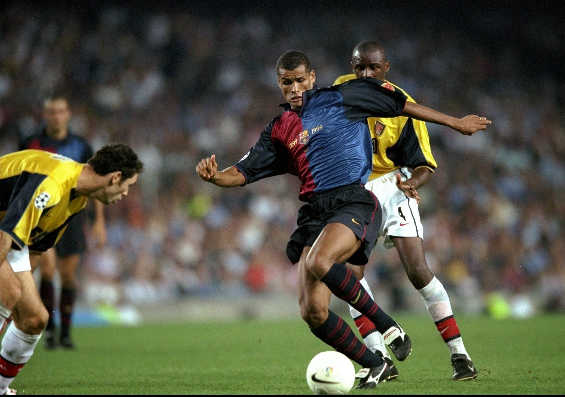 Rivaldo of Barcelona with Patrick Vieira and Martin Keown of Arsenal