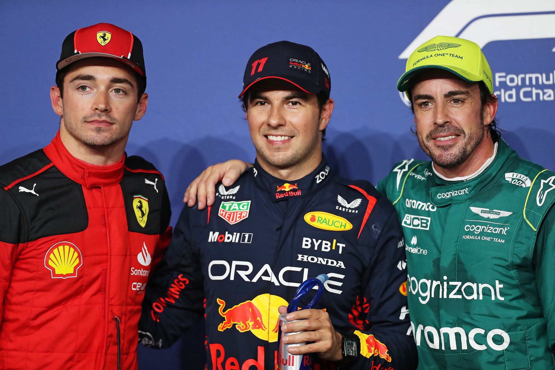 Sergio Perez (C), Charles Leclerc (L), and Fernando Alonso