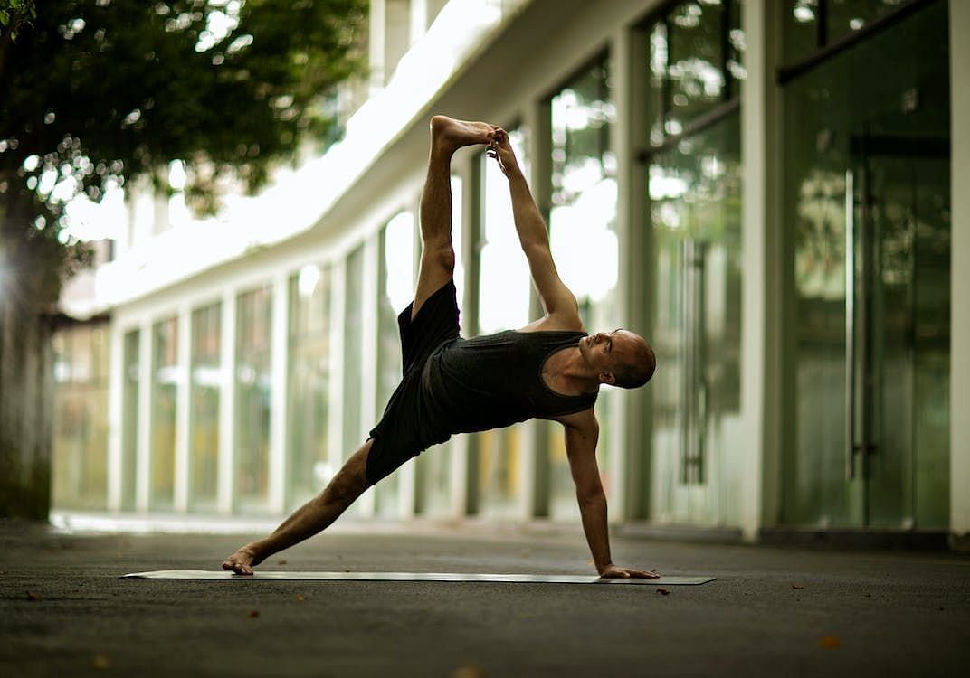 If you&#039;re new to yoga, start slowly, and gradually build up your practice. (Photo via Pexels/shu lei)