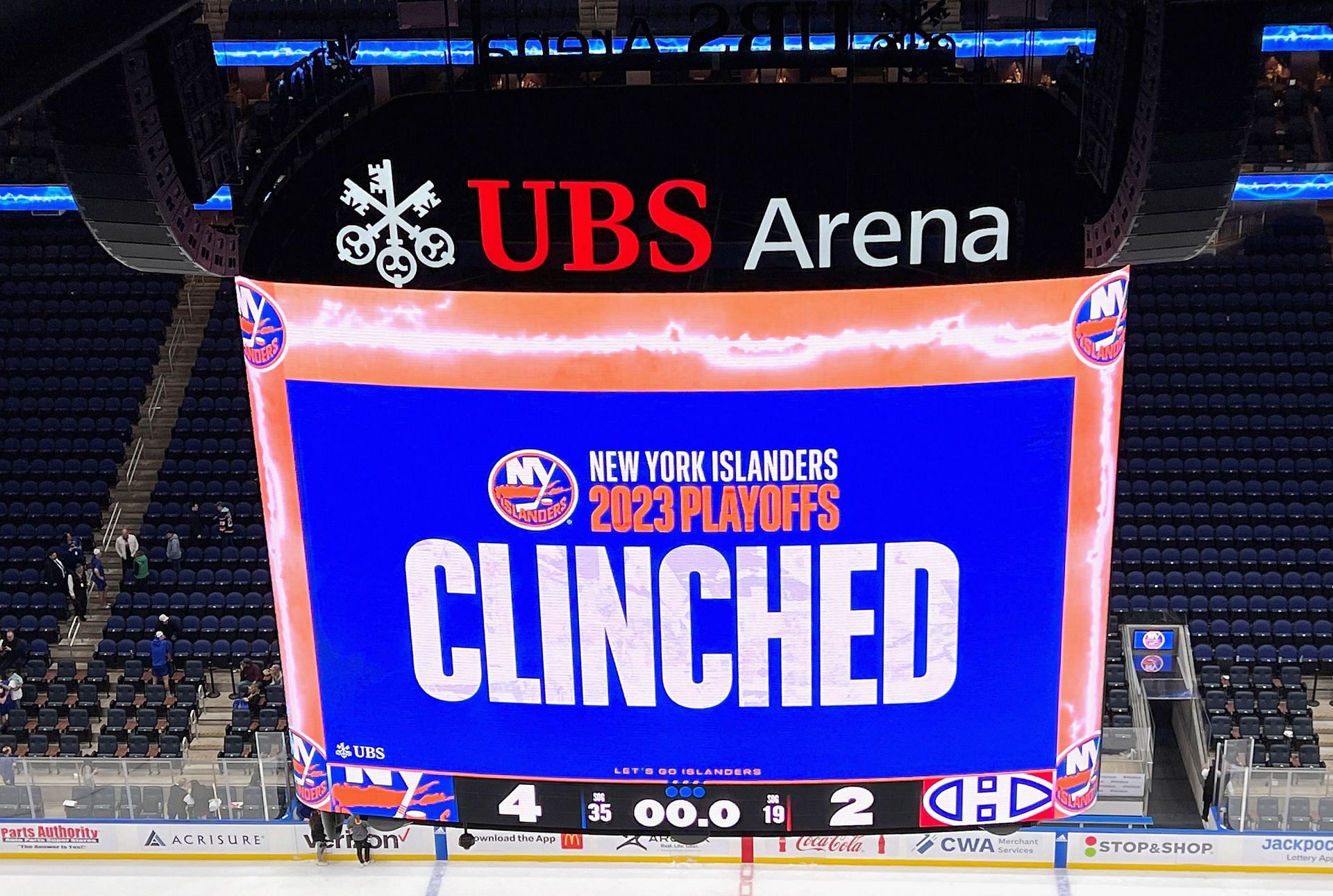 New York Islanders fans react as their team qualify for the NHL