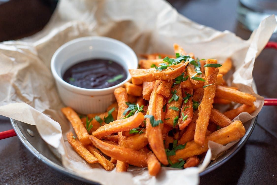 Instead of regular french fries, opt for sweet potato fries. Sweet potatoes are a great source of vitamins and minerals (Valeria Boltneva/Pexels)